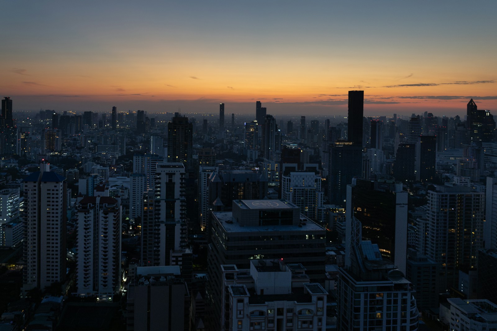 Bangkok skyline at dusk for a flight booking guide from India