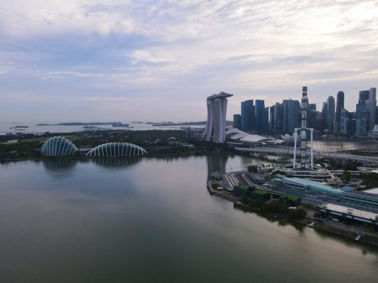 Singapore skyline at sunrise for a flight timing guide from India