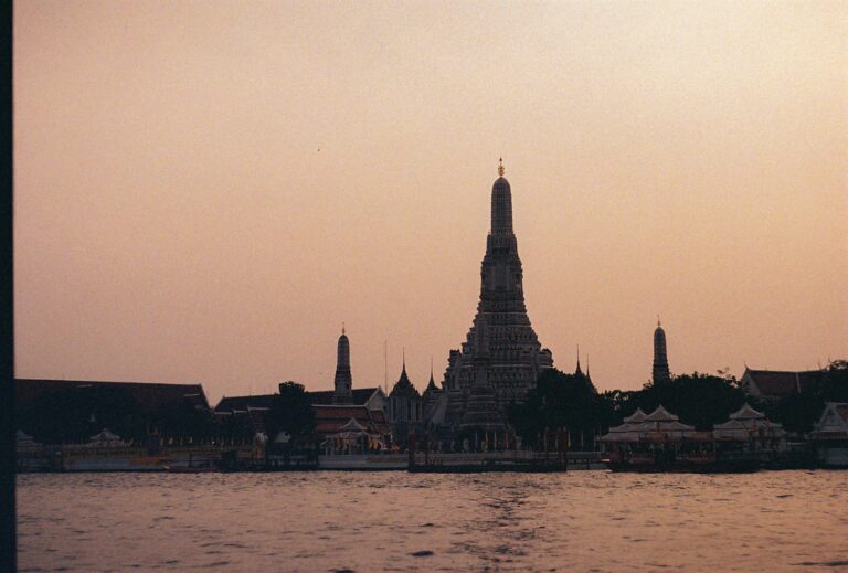 Wat Arun at sunset for a Bangkok destination guide