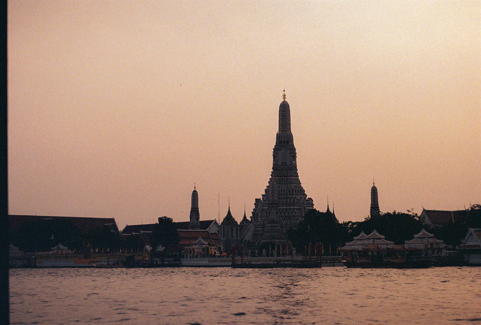 Wat Arun at sunset for a Bangkok destination guide