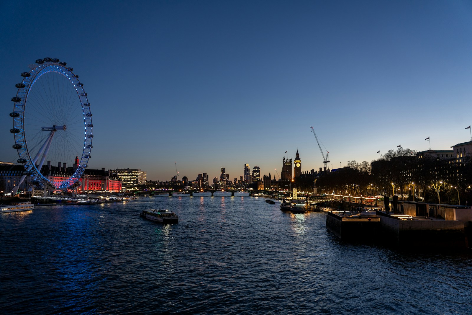 London skyline with the London Eye at dusk for a stay guide