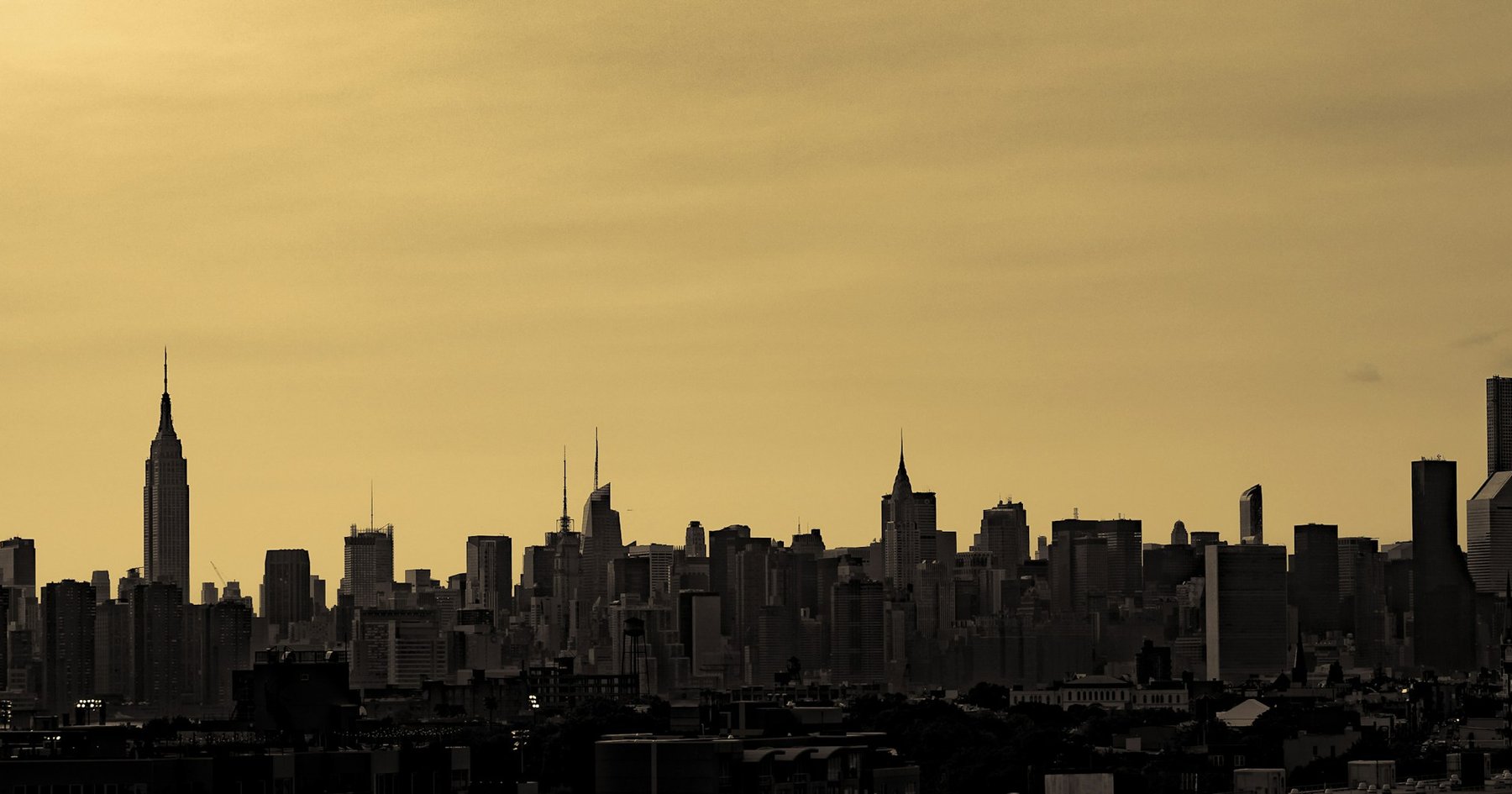 Manhattan skyline with the Empire State Building at dusk, New York