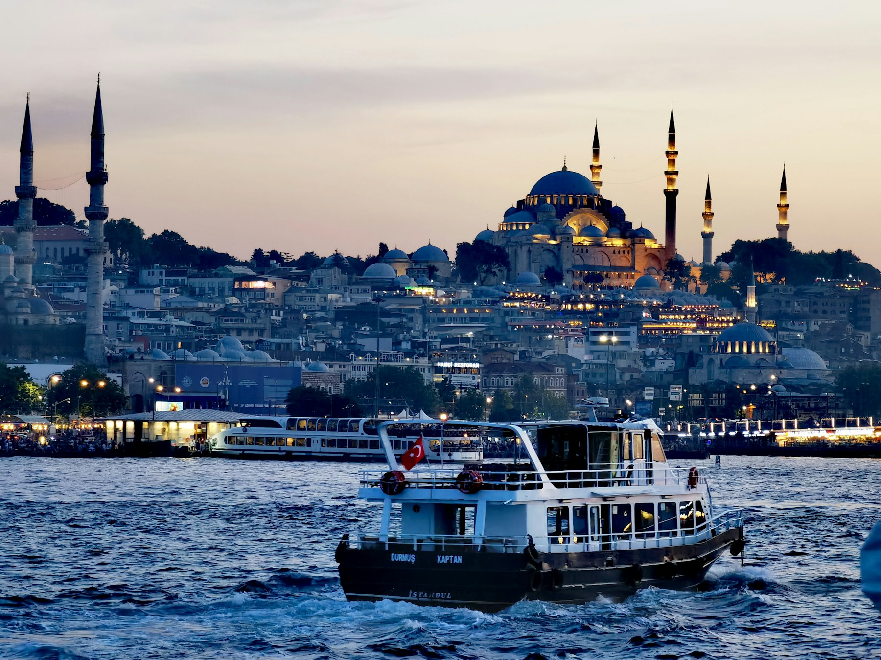 Passenger ferry on the Golden Horn below the Suleymaniye Mosque in Istanbul