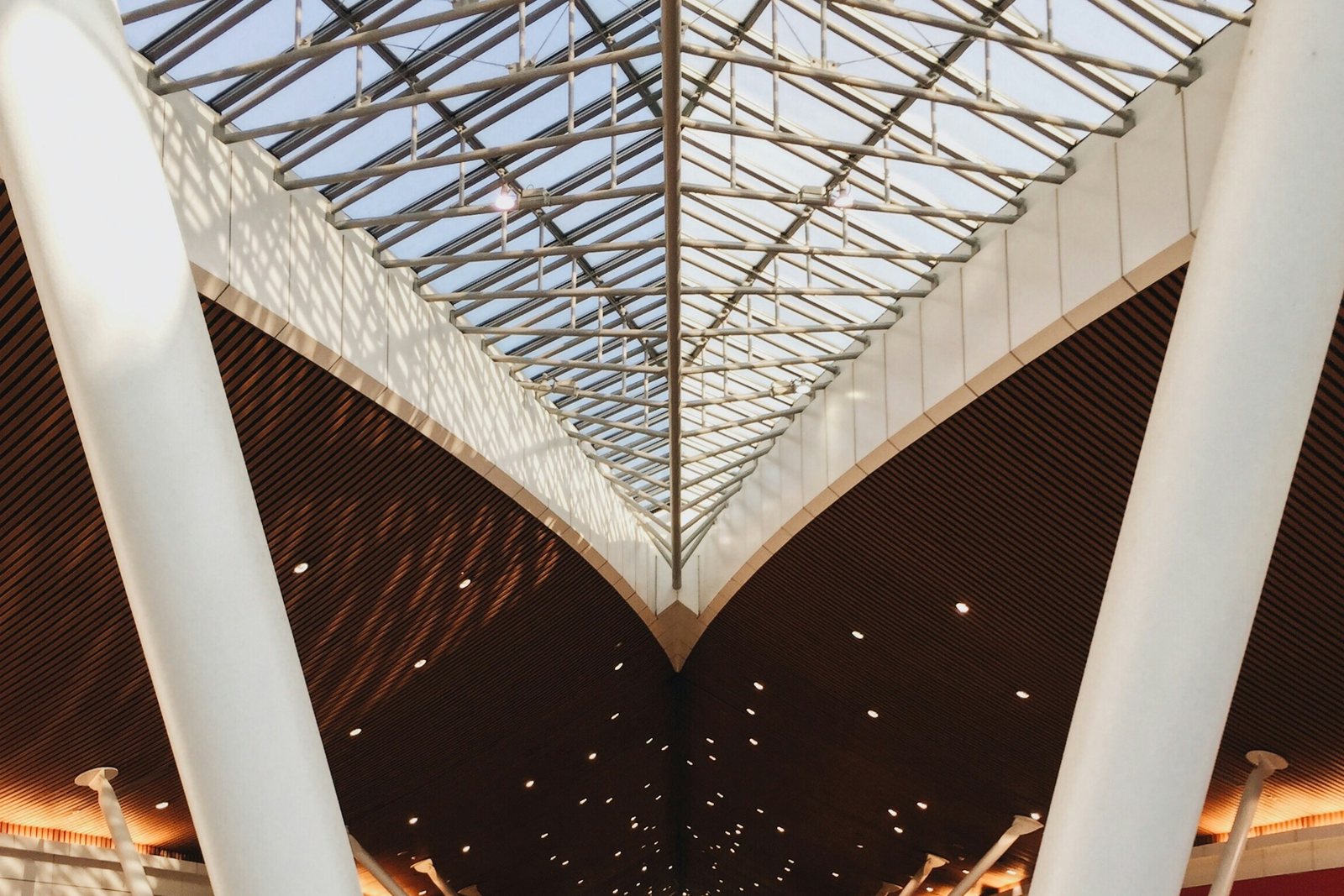 Glass roof and white columns inside the terminal at Kuala Lumpur International Airport (KLIA)